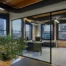 Interior office windows and glass office walls providing natural light